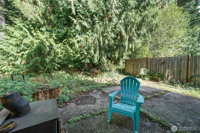 a garden view with a seating space