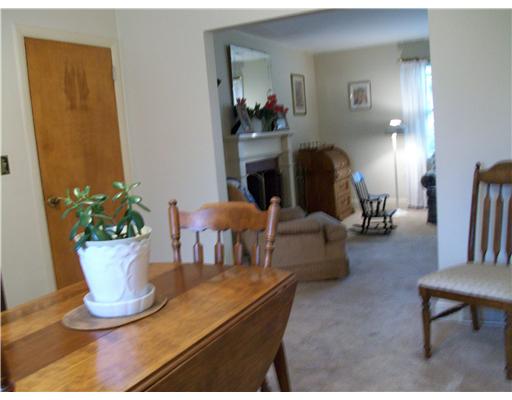 127 Ruggles Avenue Newport, RI 02840 - Photo 10 of 12 Dining Room. SUNNY DINING ROOM OPENS TO LIVING AREA HARDWOOD FLOORS UNDER CARPET