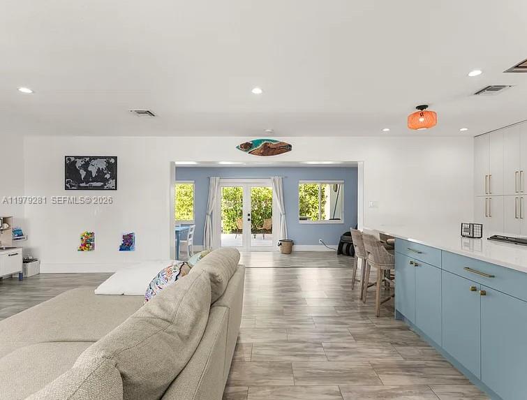 2211 Northeast 35th Court Lighthouse Point, FL 33064 - Photo 15 of 21 a living room with furniture and a large window