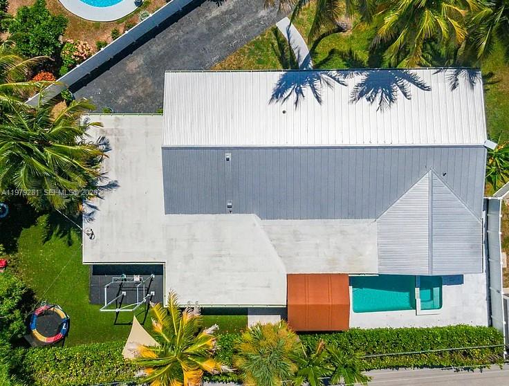 2211 Northeast 35th Court Lighthouse Point, FL 33064 - Photo 4 of 21 an aerial view of a house with a yard