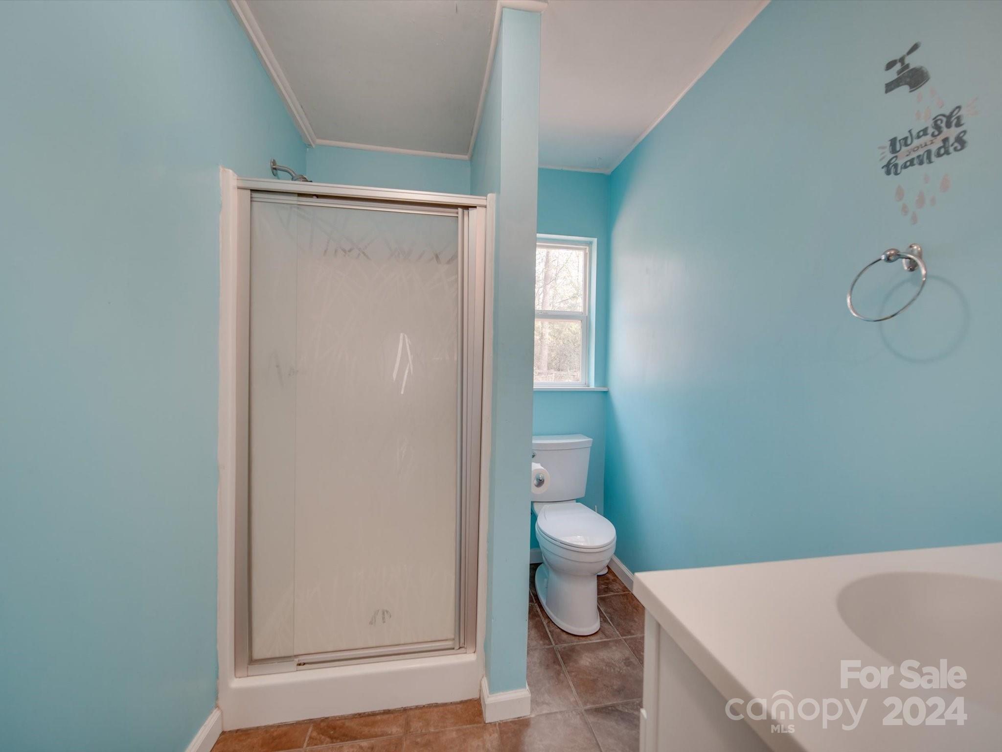 6362 Talley Road Stanfield, NC 28163 - Photo 11 of 39 a bathroom with a granite countertop bathtub and toilet