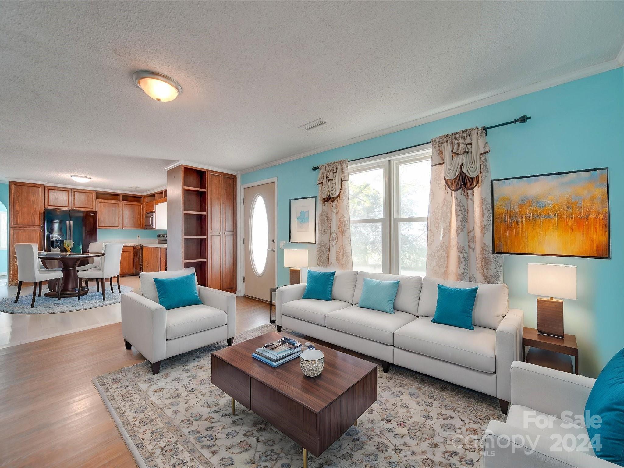 6362 Talley Road Stanfield, NC 28163 - Photo 3 of 39 a living room with furniture and a couch