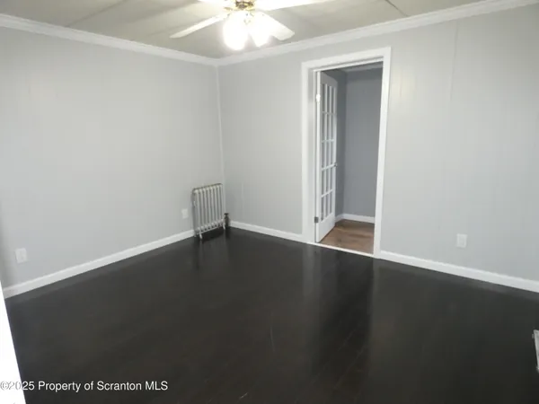 a kitchen with stainless steel appliances kitchen island granite countertop a refrigerator a sink and dishwasher