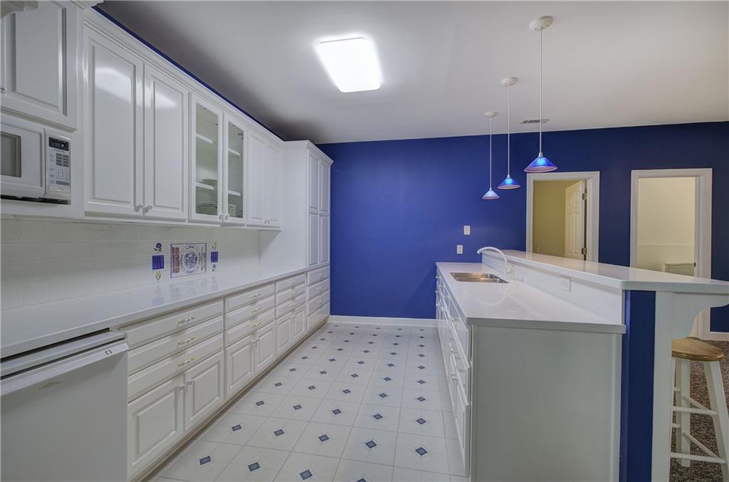 181 Fox Den Circle Jasper, GA 30143 - Photo 58 of 111 a bathroom with a sink a vanity and a mirror