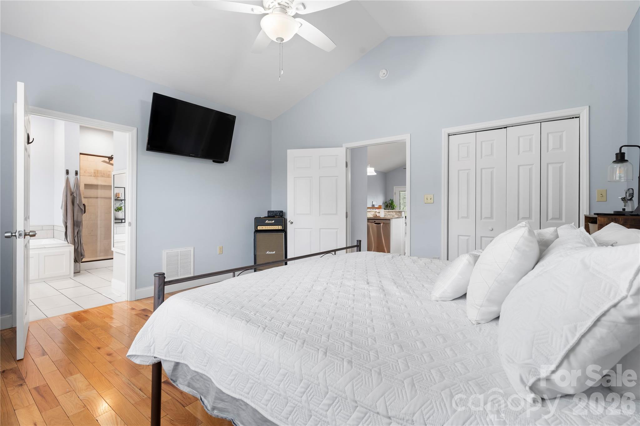 111 Pinewood Road Granite Falls, NC 28630 - Photo 14 of 33 a bedroom with a bed and a flat screen tv
