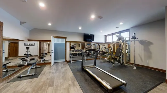 a view of a room with gym equipment