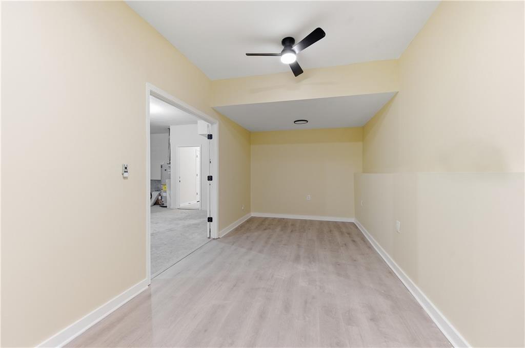 3363 Old Oaks Road Buford, GA 30519 - Photo 21 of 29 a view of an empty room