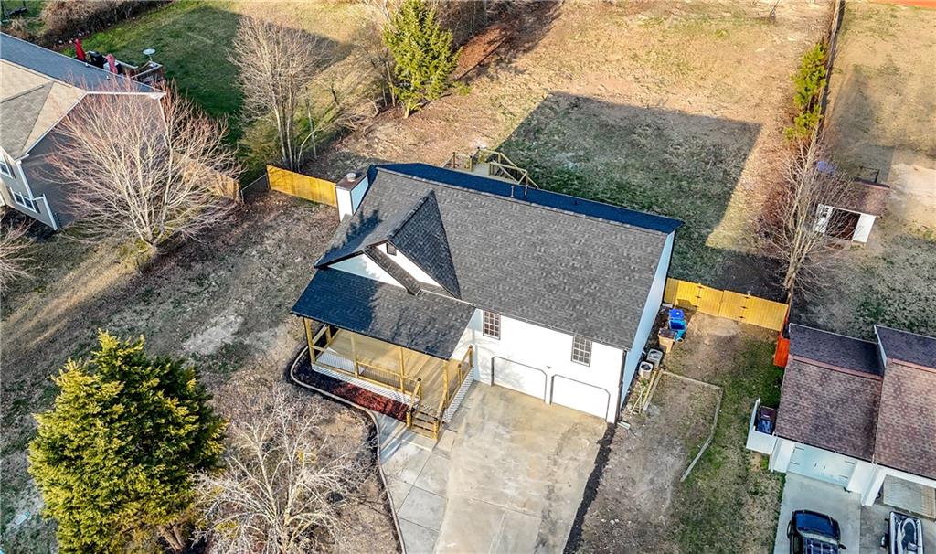 3363 Old Oaks Road Buford, GA 30519 - Photo 25 of 29 an aerial view of house with yard and outdoor space