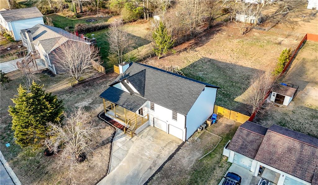3363 Old Oaks Road Buford, GA 30519 - Photo 26 of 29 an aerial view of a house