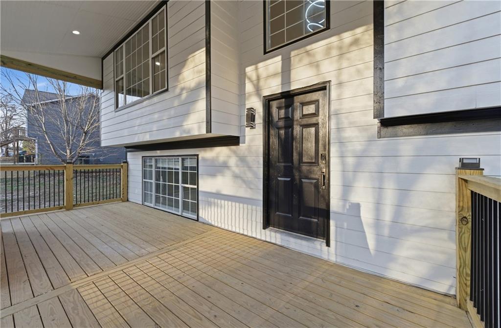 3363 Old Oaks Road Buford, GA 30519 - Photo 3 of 29 a view of empty room with wooden floor