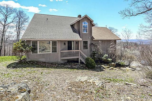 54 Geiger Road New Milford, CT 06776 - Photo 1 of 1 a front view of a house with a yard