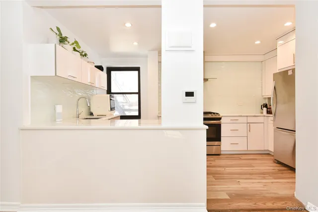 $430,000 | 211-06 75th Avenue, Unit 2E | Oakland Gardens