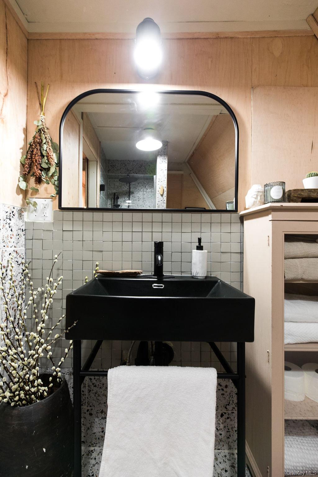 161 Pine Hill Road Shandaken, NY 12410 - Photo 32 of 39 Bathroom with tile walls and a sink