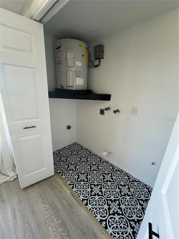 4117 Hampton Drive New Port Richey, FL 34652 - Photo 11 of 23 a view of utility room