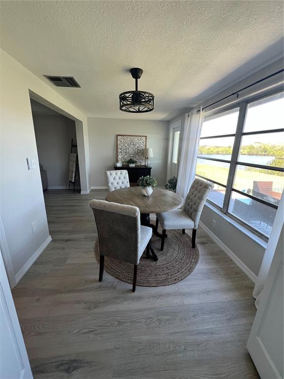 4117 Hampton Drive New Port Richey, FL 34652 - Photo 10 of 23 a work room with furniture and a window