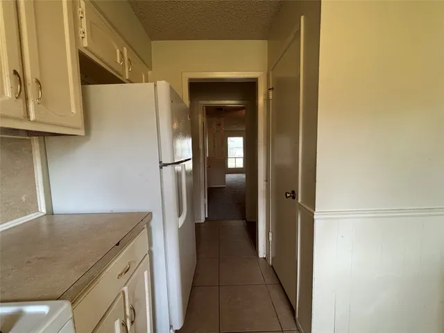 a house with garden in front of it