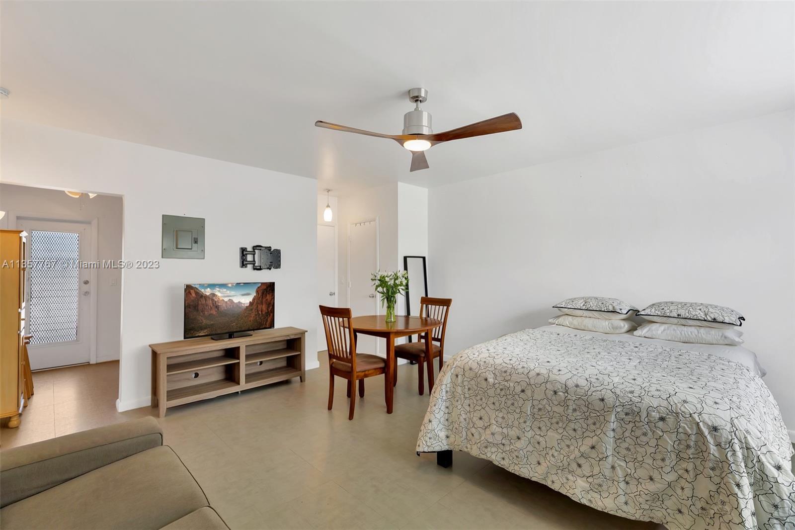 31 South Golfview Road, Unit 2 Lake Worth, FL 33460 - Photo 1 of 18 a bedroom with a bed and furniture