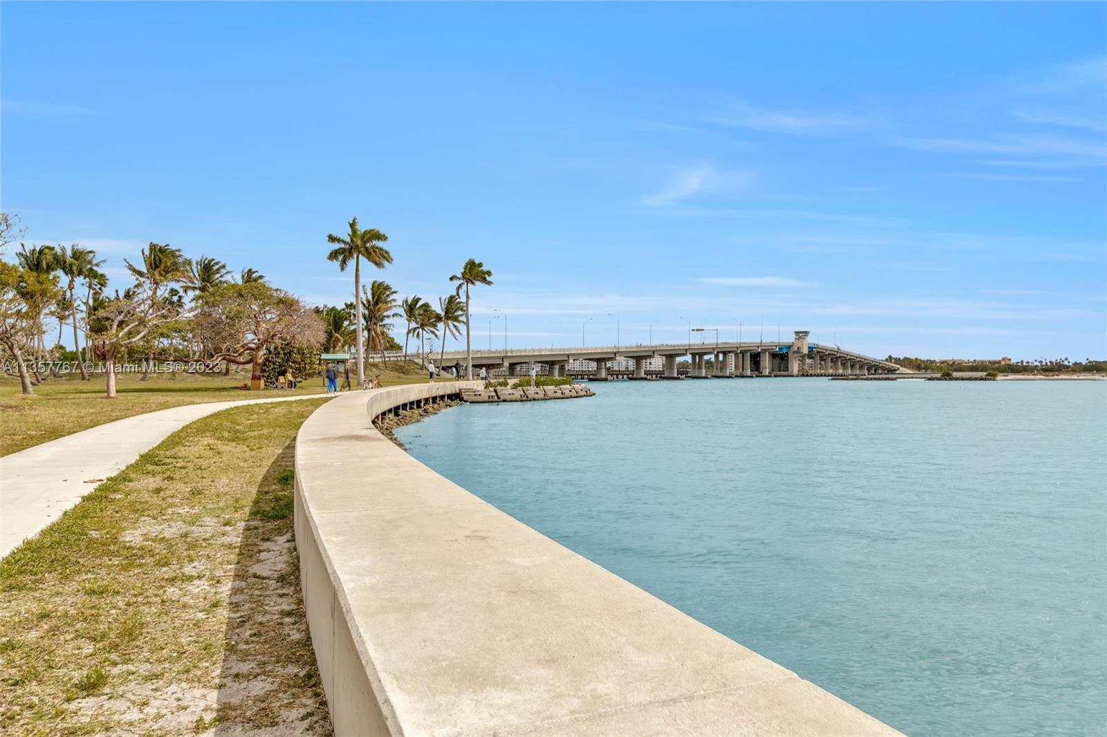 31 South Golfview Road, Unit 2 Lake Worth, FL 33460 - Photo 9 of 18 a view of a swimming pool and an ocean