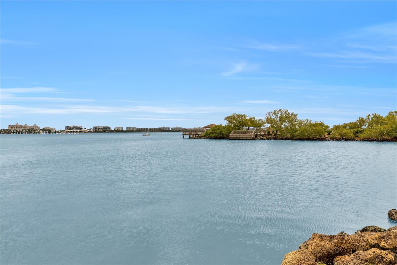 31 South Golfview Road, Unit 2 Lake Worth, FL 33460 - Photo 10 of 18 a view of a lake with houses in the back