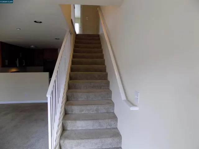 a bedroom with a bed and a view of bathroom