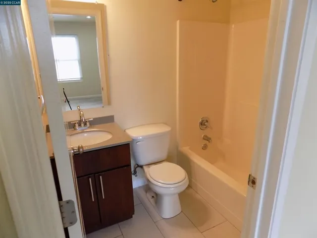 a view of a room with a hallway