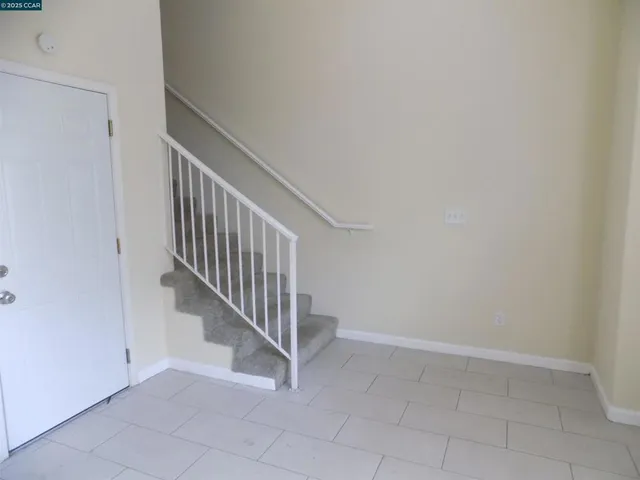 a view of entryway with stairs