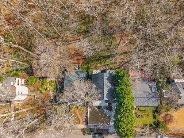 an aerial view of residential house with outdoor space