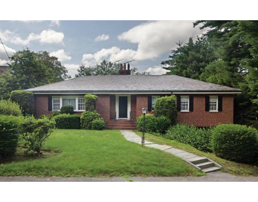 20 Cotswold Road Brookline, MA 02445 - Photo 1 of 5 a front view of a house with a yard and potted plants