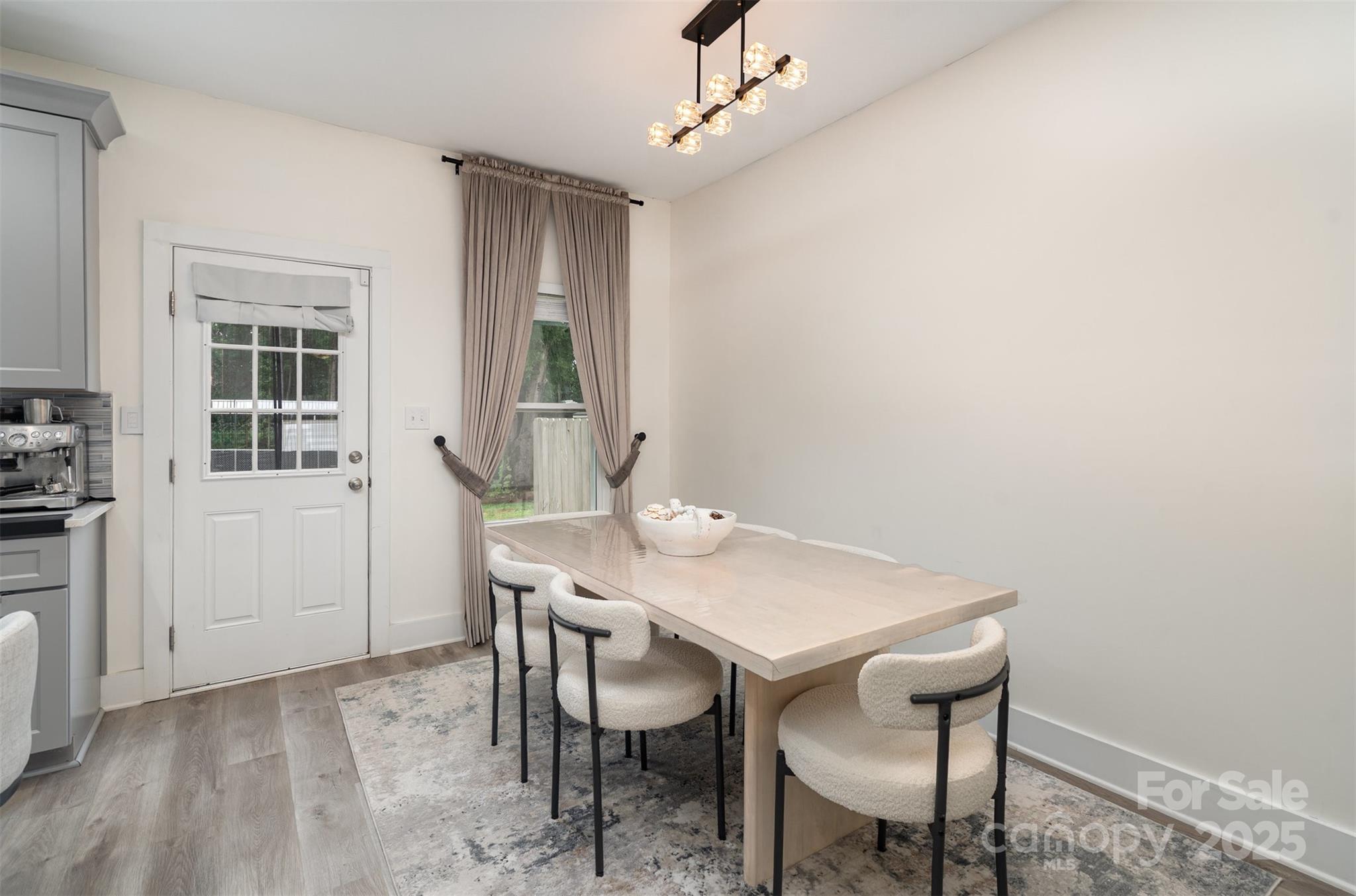 1052 McLain Road Kannapolis, NC 28083 - Photo 12 of 30 a view of a dining room with furniture and window