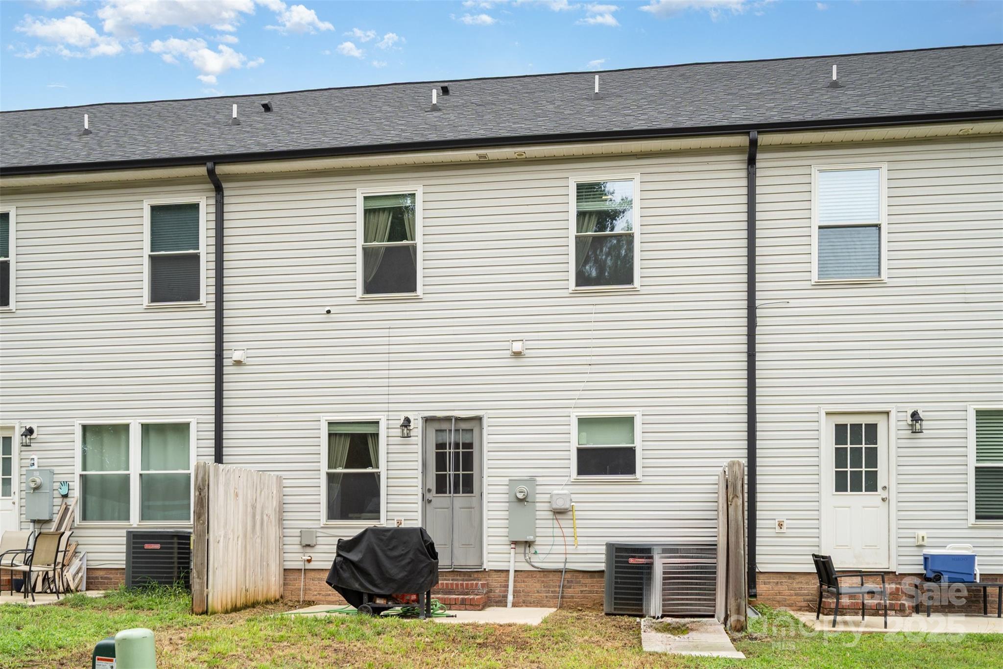 1052 McLain Road Kannapolis, NC 28083 - Photo 29 of 30 a view of a house with a yard and large window