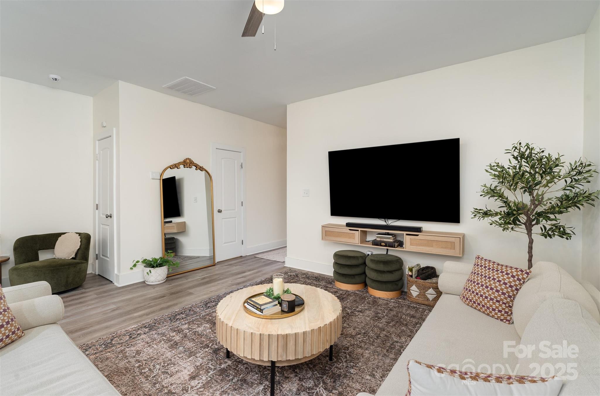 1052 McLain Road Kannapolis, NC 28083 - Photo 3 of 30 a living room with furniture and a flat screen tv