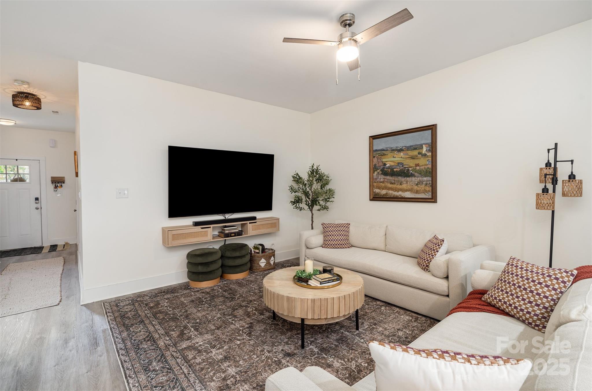 1052 McLain Road Kannapolis, NC 28083 - Photo 8 of 30 a living room with furniture and a flat screen tv