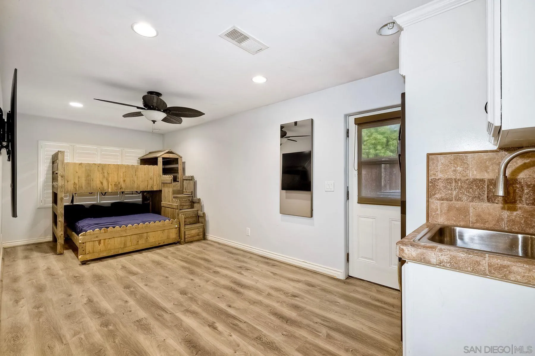 3511 Sitio Baya Carlsbad, CA 92009 - Photo 14 of 42 a view of kitchen with stainless steel appliances granite countertop sink and stove top oven