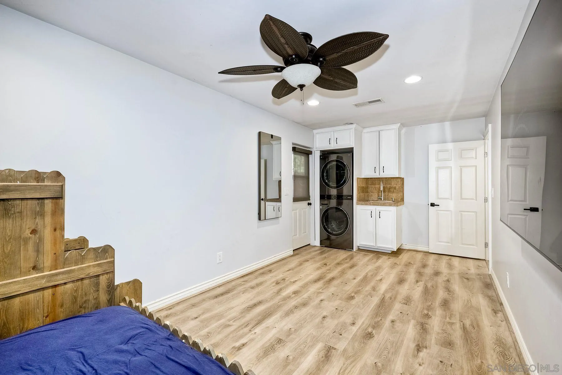 3511 Sitio Baya Carlsbad, CA 92009 - Photo 15 of 42 a bedroom with a bed and a television