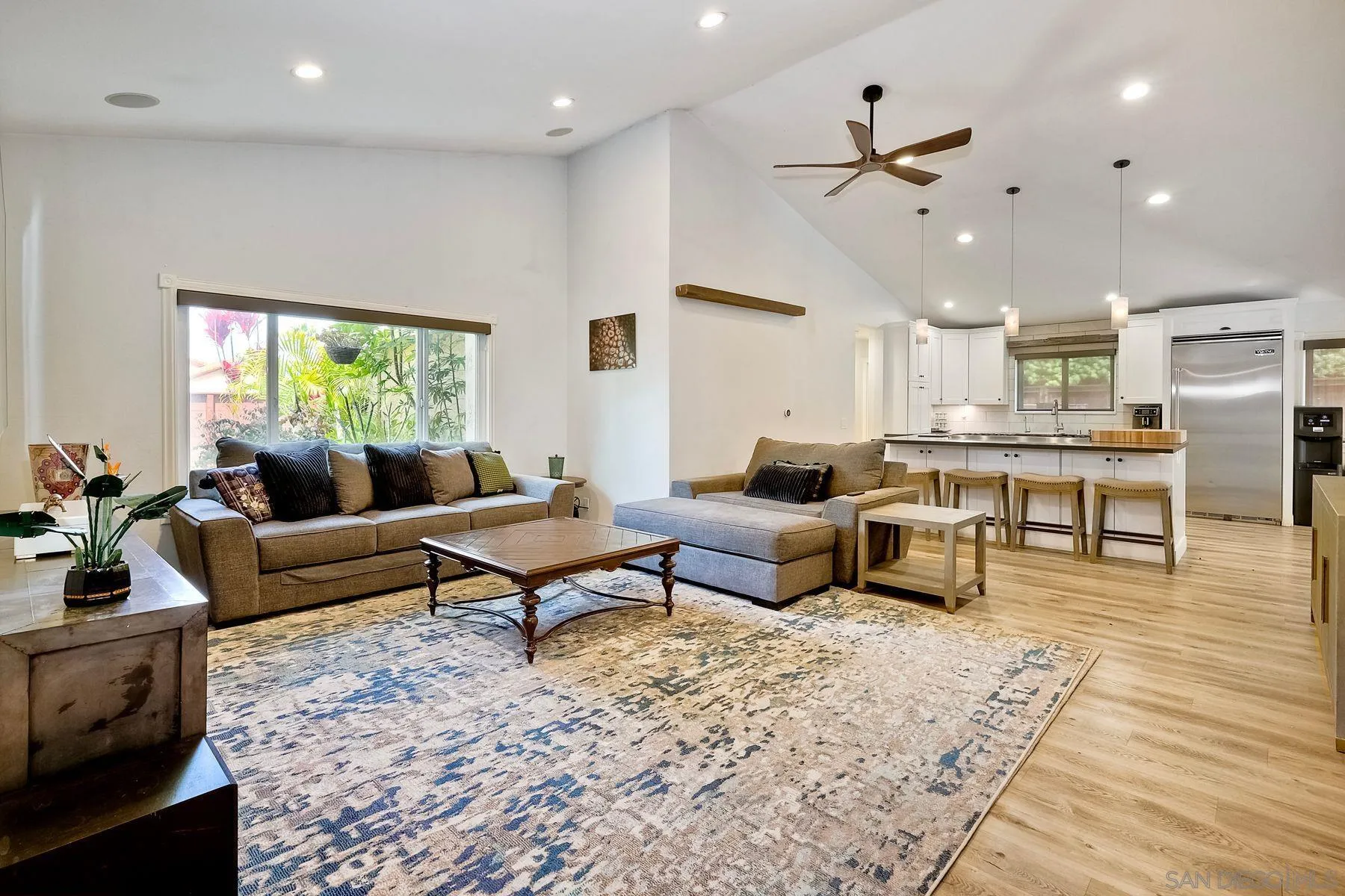 3511 Sitio Baya Carlsbad, CA 92009 - Photo 2 of 42 a living room with furniture and a large window