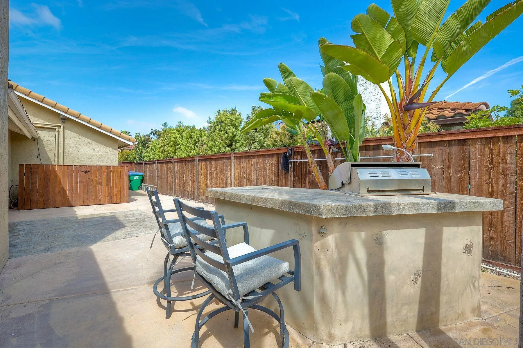 3511 Sitio Baya Carlsbad, CA 92009 - Photo 27 of 42 a table and chairs in a patio of the house