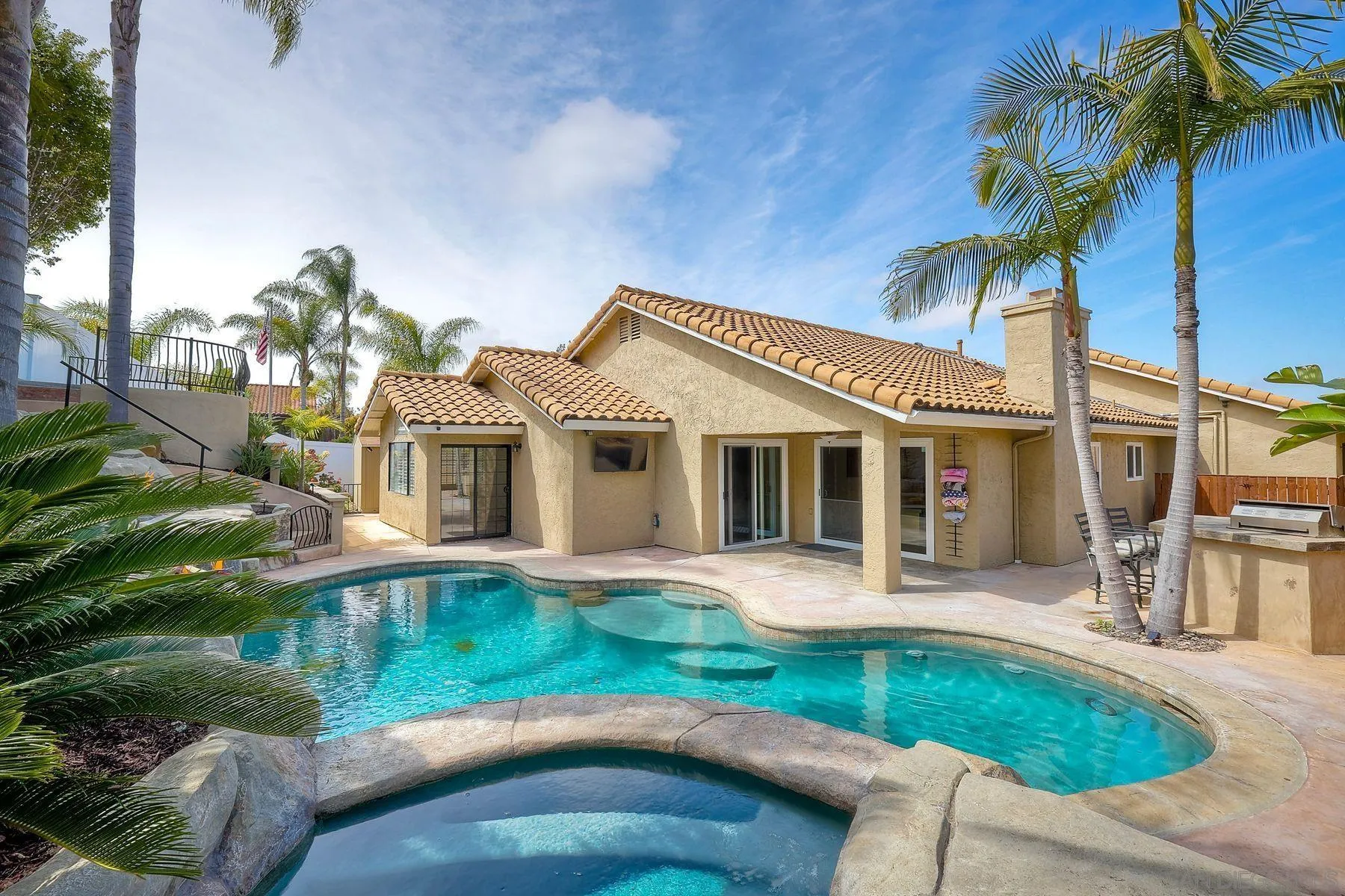 3511 Sitio Baya Carlsbad, CA 92009 - Photo 30 of 42 a front view of a house with garden