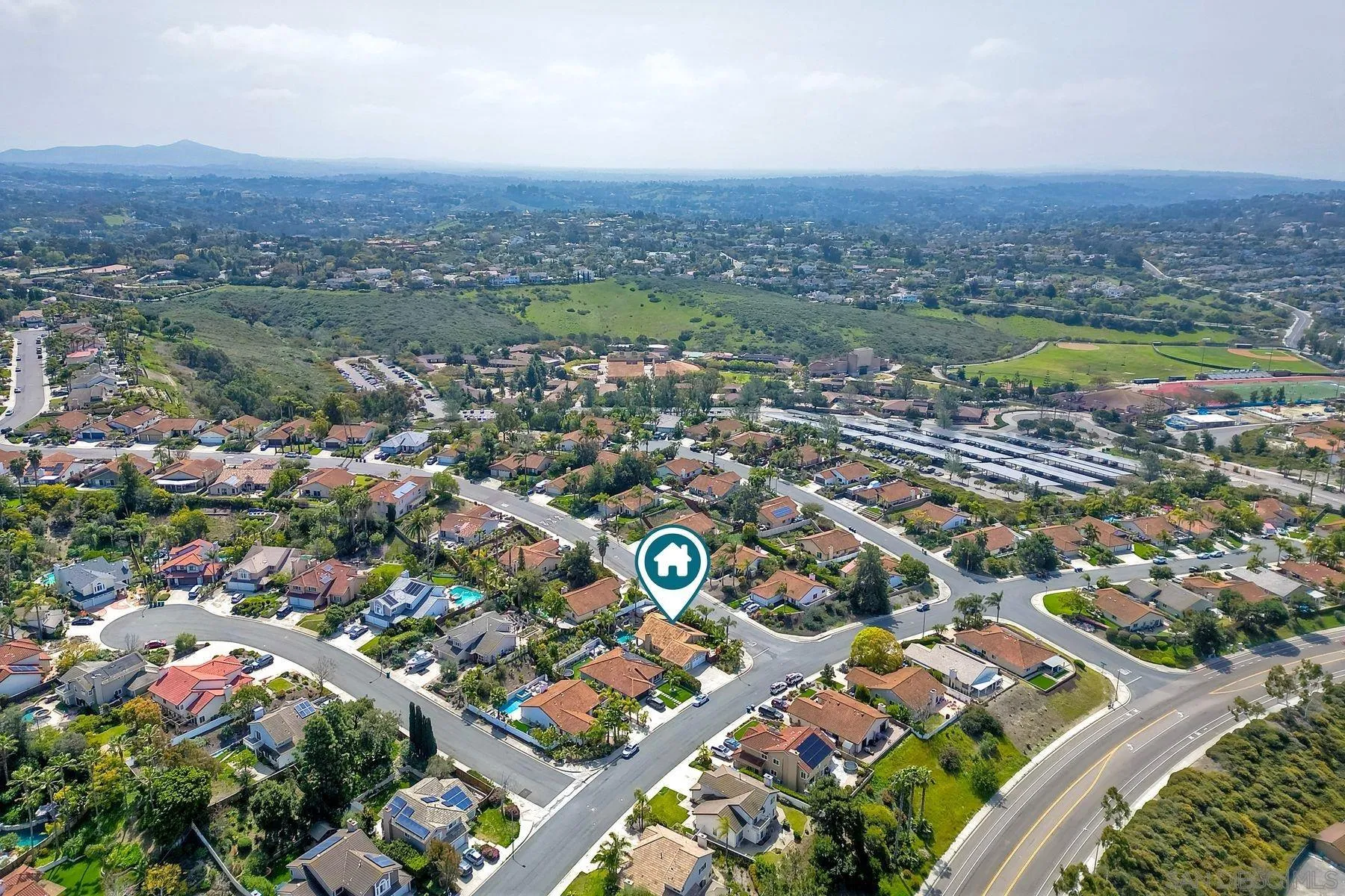 3511 Sitio Baya Carlsbad, CA 92009 - Photo 42 of 42 an aerial view of city and lake
