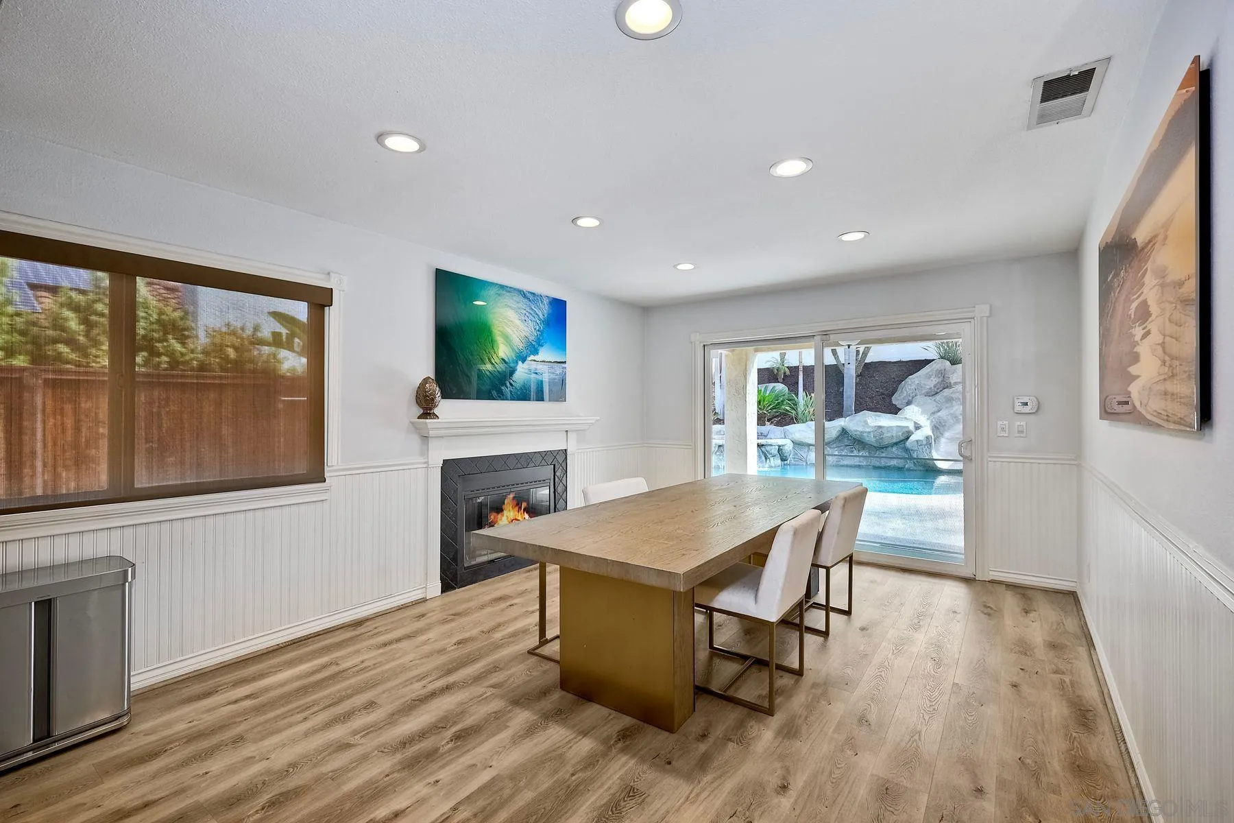 3511 Sitio Baya Carlsbad, CA 92009 - Photo 6 of 42 a dining room with a table and chairs
