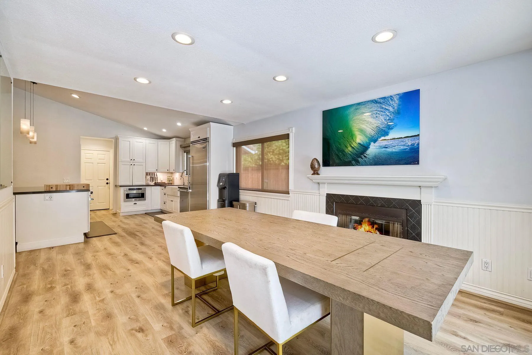 3511 Sitio Baya Carlsbad, CA 92009 - Photo 8 of 42 a view of kitchen with cabinets and wooden floor