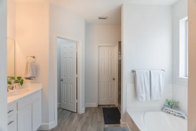 a bathroom with a sink and a tub