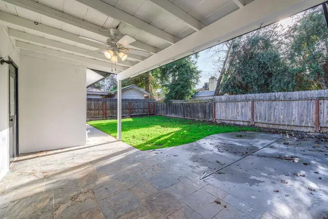 a view of a backyard with a big yard