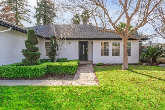 a view of a house with garden