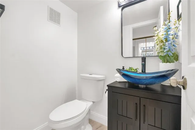 a view of a bathroom with a toilet