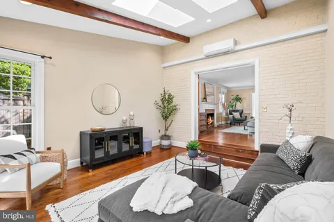 a bathroom with a sink a mirror and shower