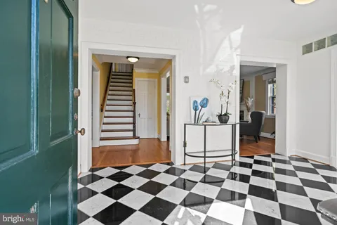 a kitchen with stainless steel appliances granite countertop a stove and a refrigerator