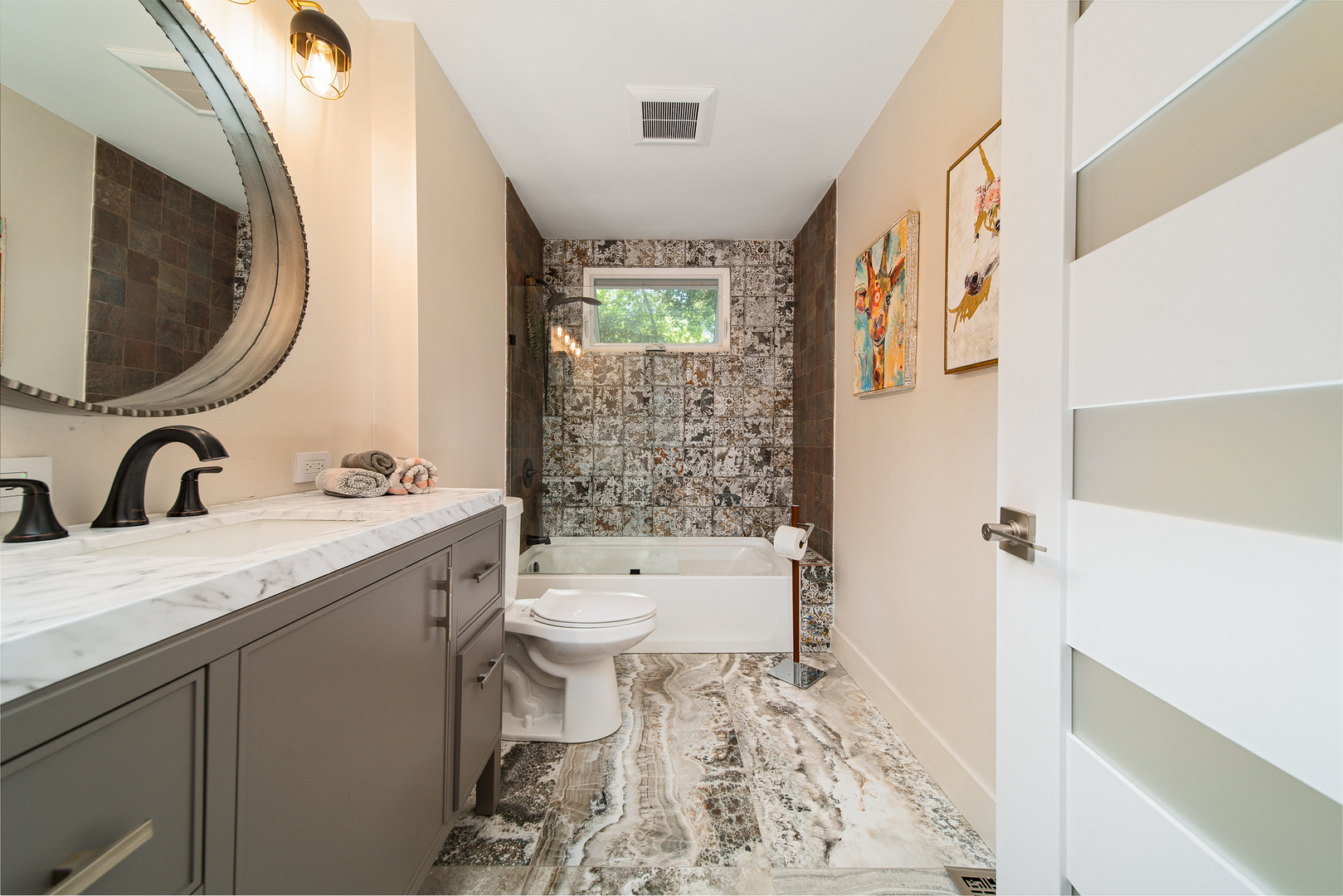 20665 Weiland Road Lincolnshire, IL 60069 - Photo 21 of 32 a bathroom with a granite countertop toilet a sink and a mirror