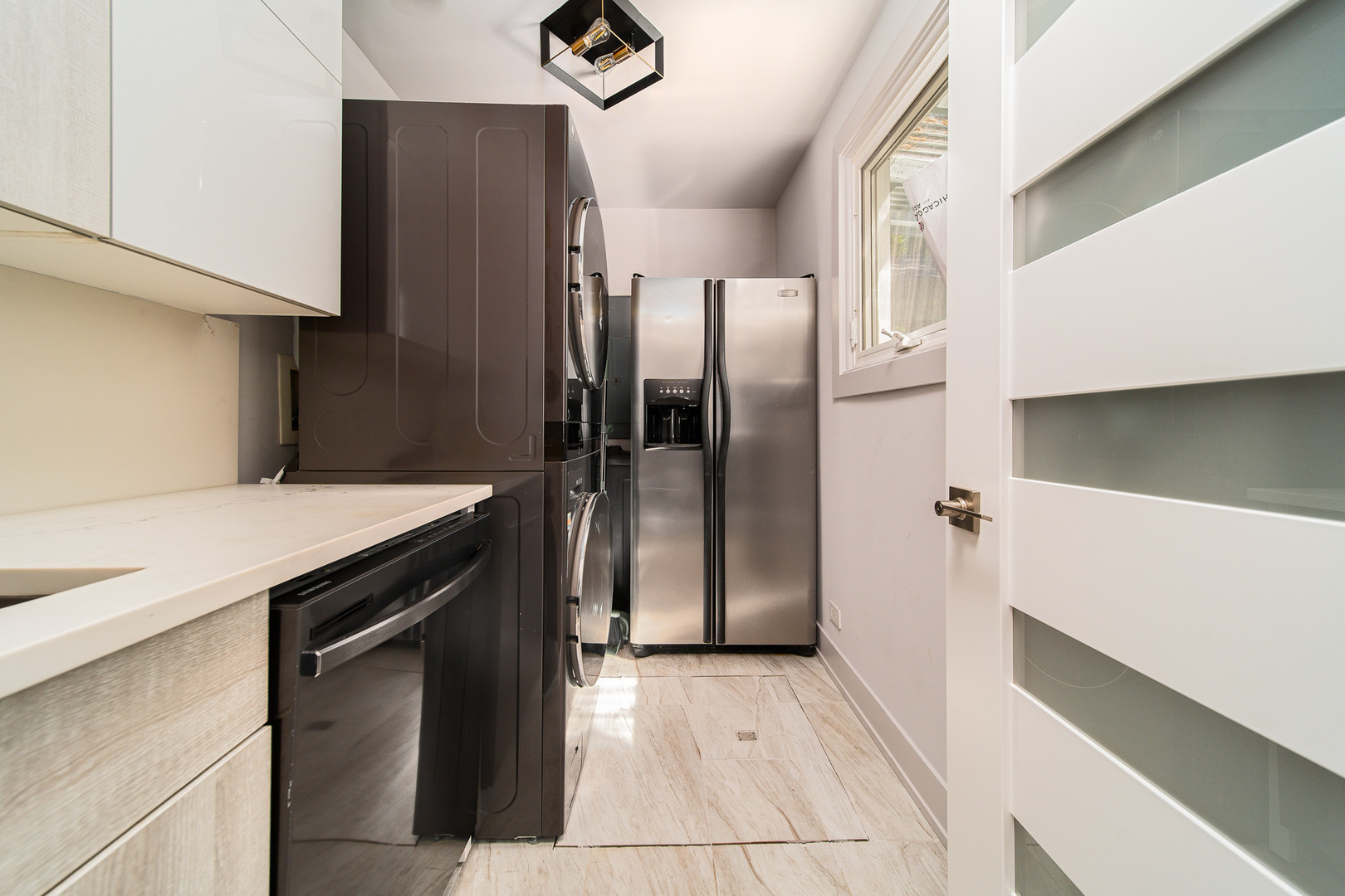 20665 Weiland Road Lincolnshire, IL 60069 - Photo 27 of 32 a kitchen with stainless steel appliances a refrigerator and a stove