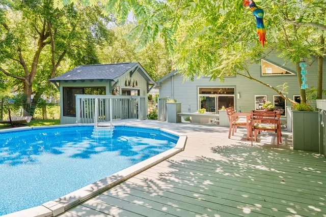 a house view with a sitting space and garden space