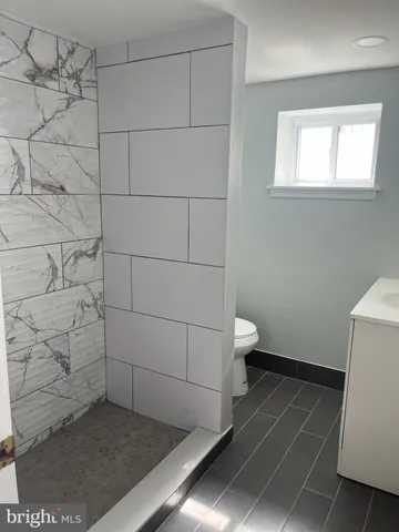 a bathroom with a toilet